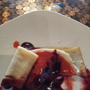 Zest Garden Cafe - End of my Necessity crepe, Nutella and berry compote syrup. - Breakfast & Brunch Near Me - Lincoln City, Oregon Zest Garden Cafe - End of my Necessity crepe, Nutella and berry compote syrup. - Breakfast & Brunch Near Me - Lincoln City, Oregon