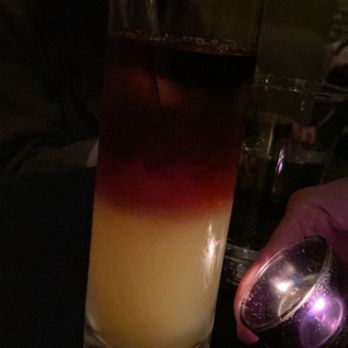 The Aviary - a drink that had rum popping boba - Cocktail Bars Near Me - Chicago, Illinois