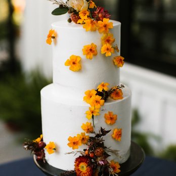Flour & Bloom Cakes - a three tiered cake with flowers on top - Custom Cakes Near Me - Glen Ellen, California Flour & Bloom Cakes - a three tiered cake with flowers on top - Custom Cakes Near Me - Glen Ellen, California