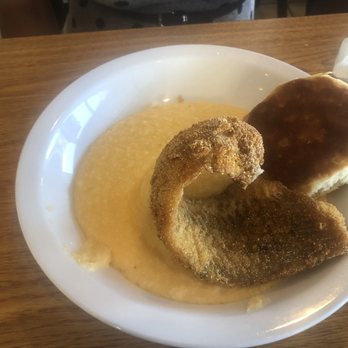 Huskers Cafe - Fish and grits bowl with a biscuit. Whiting fish - Breakfast & Brunch Near Me - Stone Mountain, Georgia Huskers Cafe - Fish and grits bowl with a biscuit. Whiting fish - Breakfast & Brunch Near Me - Stone Mountain, Georgia