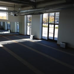 Bikram Yoga - Our spacious and sunny yoga room.