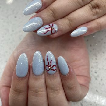 TN Unique Nails & Spa - Almond shaped nails with red bow - Nail Salons Near Me - Campbell, California TN Unique Nails & Spa - Almond shaped nails with red bow - Nail Salons Near Me - Campbell, California