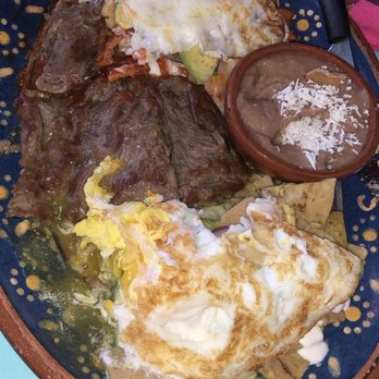 Orlando's - Trio Mexicano- Chilaquilas divorciadas (red and green sauce) - Mexican Near Me - Loreto, BCS Orlando's - Trio Mexicano- Chilaquilas divorciadas (red and green sauce) - Mexican Near Me - Loreto, BCS
