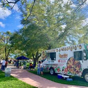 Ricotta Collection - a food truck parked in a park - Italian Near Me Ricotta Collection - a food truck parked in a park - Italian Near Me