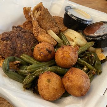 CJ's Kitchen & Grille - Seafood Platter. Fish, hushpuppies & house made tarter were very good! :)' - American Near Me - Pensacola, Florida CJ's Kitchen & Grille - Seafood Platter. Fish, hushpuppies & house made tarter were very good! :)' - American Near Me - Pensacola, Florida