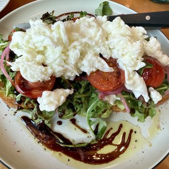 Toast Kitchen & Bakery - Outstanding Avocado Toast with added scrambled egg whites - Breakfast & Brunch Near Me - Tustin, California Toast Kitchen & Bakery - Outstanding Avocado Toast with added scrambled egg whites - Breakfast & Brunch Near Me - Tustin, California