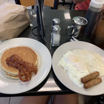 Quinn’s - Breakfast combo! Comes with 2 pancakes, 2 Bacon's, 2 large eggs, 2 sausages, and grits. All for $8! - Breakfast & Brunch Near Me - Savannah, Georgia Quinn’s - Breakfast combo! Comes with 2 pancakes, 2 Bacon's, 2 large eggs, 2 sausages, and grits. All for $8! - Breakfast & Brunch Near Me - Savannah, Georgia