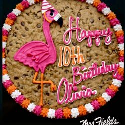 Custom flamingo birthday cookie cake made fresh at Mrs. Fields Freehold Raceway Mall in Freehold NJ. Same day pickup.