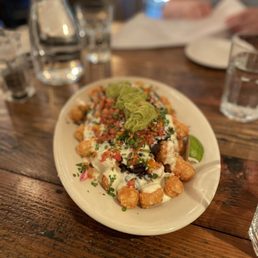 Totchos appetizer (we got the large) for our party of 4! Totchos appetizer (we got the large) for our party of 4!