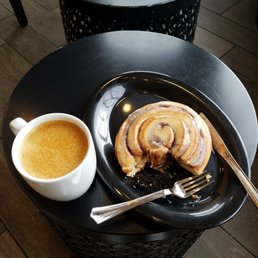 Latte and a hot cinnamon roll! Latte and a hot cinnamon roll!