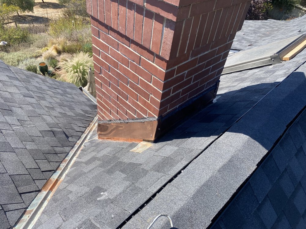 Slide of Luis Roofing