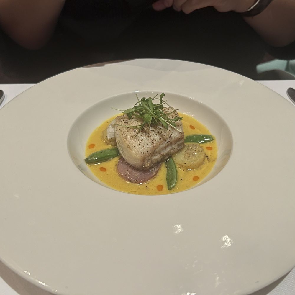 Halibut with yellow pepper broth Yellow pepper broth and drizzled with paprika oil Halibut with yellow pepper broth Yellow pepper broth and drizzled with paprika oil