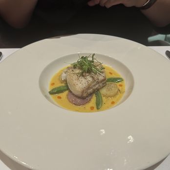 Vintage Steakhouse - Halibut with yellow pepper broth Yellow pepper broth and drizzled with paprika oil - Steakhouses Near Me - Coarsegold, California Vintage Steakhouse - Halibut with yellow pepper broth Yellow pepper broth and drizzled with paprika oil - Steakhouses Near Me - Coarsegold, California