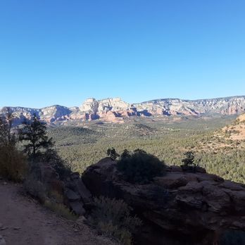Devil's Bridge Trail - Scenery behind the bridge. - Hiking Near Me - Sedona, Arizona Devil's Bridge Trail - Scenery behind the bridge. - Hiking Near Me - Sedona, Arizona