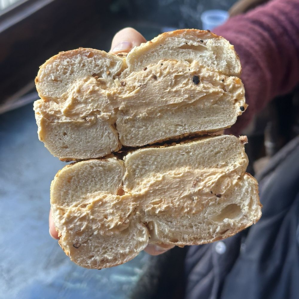 Bagel Pub - Sriracha on onion bagel - Bagels Near Me - New York, New York Bagel Pub - Sriracha on onion bagel - Bagels Near Me - New York, New York
