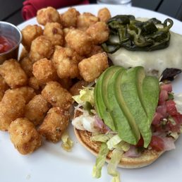 Southwestern burger with tater tots!! Southwestern burger with tater tots!!