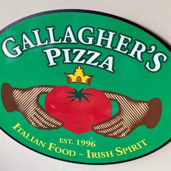Gallagher's Pizza - Green Bay - a hand holding a tomato - Pizza Near Me - Green Bay, Wisconsin Gallagher's Pizza - Green Bay - a hand holding a tomato - Pizza Near Me - Green Bay, Wisconsin
