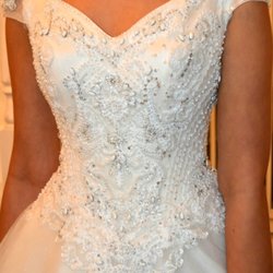 Savoy Tailors & Drycleaners - Waist took in and straps shortened and length shortened