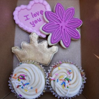 Wendy Whites Bakery - An assortment of Princess/love cookies and cupcakes from their case. - Custom Cakes Near Me - Atascadero, California Wendy Whites Bakery - An assortment of Princess/love cookies and cupcakes from their case. - Custom Cakes Near Me - Atascadero, California