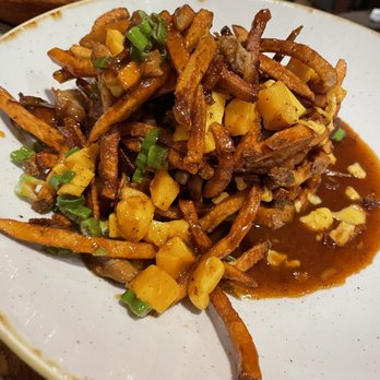 Liquid Assets - Old bay pork belly cheddar poutine fries ...massive - and amazing. - American Near Me - Ocean City, Maryland Liquid Assets - Old bay pork belly cheddar poutine fries ...massive - and amazing. - American Near Me - Ocean City, Maryland