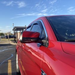 Matt's Express Wash - Bent backwards mirror due to reversed directional brushes.