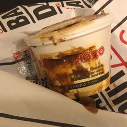Hungry Hobo - The dent that caused the chili to explode in the bag. Needless to say, it immediately went in the trash. What a waste of money!