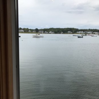 Cape Pier Chowder House - Looking from inside out to the marina - Seafood Near Me - Kennebunkport, Maine Cape Pier Chowder House - Looking from inside out to the marina - Seafood Near Me - Kennebunkport, Maine
