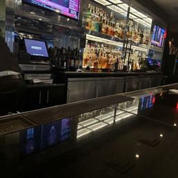 A seat at the bar after a long day of travel suits me just fine.