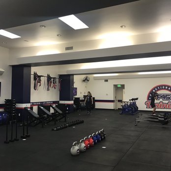 F45 Training Queen Anne - Main floor with pull up bars, rowing machines, and bikes. - Circuit Training Gyms Near Me - Seattle, Washington