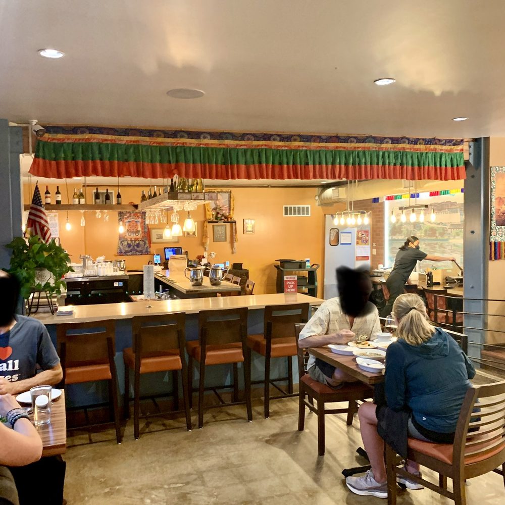 Little Tibet - people sitting at tables in a restaurant - Indian Near Me - Boulder, Colorado