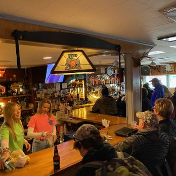 Rusty Nail - a group of people sitting at a bar - Dive Bars Near Me - Saranac Lake, New York Rusty Nail - a group of people sitting at a bar - Dive Bars Near Me - Saranac Lake, New York
