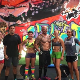 Level 2 Crossfit athletes smiling through the pain Level 2 Crossfit athletes smiling through the pain