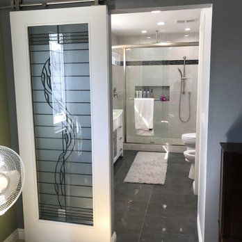 Nikki Construction - a view of a bathroom through a sliding glass door - General Contractors Near Me - Sherman Oaks, California Nikki Construction - a view of a bathroom through a sliding glass door - General Contractors Near Me - Sherman Oaks, California