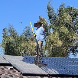 Jesse, Owner of All Valley Solar Panel & Window Cleaning, is cleaning my dirty solar panels! Jesse, Owner of All Valley Solar Panel & Window Cleaning, is cleaning my dirty solar panels!