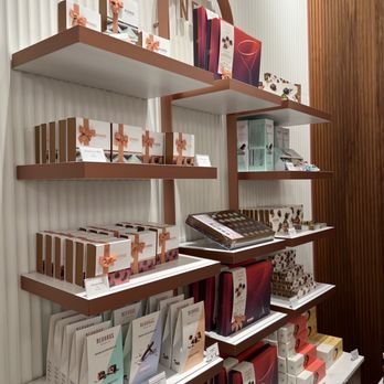 Neuhaus - New York - shelves of products - Chocolatiers & Shops Near Me - New York, New York Neuhaus - New York - shelves of products - Chocolatiers & Shops Near Me - New York, New York