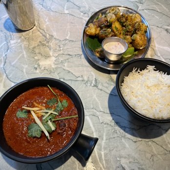 Dishoom - Chicken Ruby with Basmati Rice and Gunpowder Potatoes - Indian Near Me - London, XGL Dishoom - Chicken Ruby with Basmati Rice and Gunpowder Potatoes - Indian Near Me - London, XGL