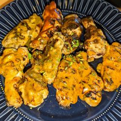 Russian Roulette Wings $26 (comes with your choice of 2 sides). Wings are randomly sauces...Live Dangerously! lol