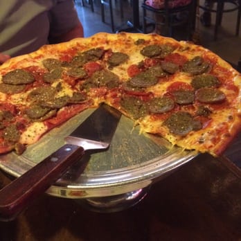 Five Points Pizza - This is great place for pizza! Try the garlic knots, pictured is the T-Rex pizza- meaty & tasty - Italian Near Me - Nashville, Tennessee