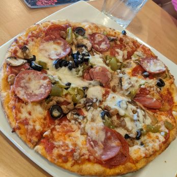 Venezia Trattoria - Meat Lovers Pizza - Italian Near Me - McKinney, Texas