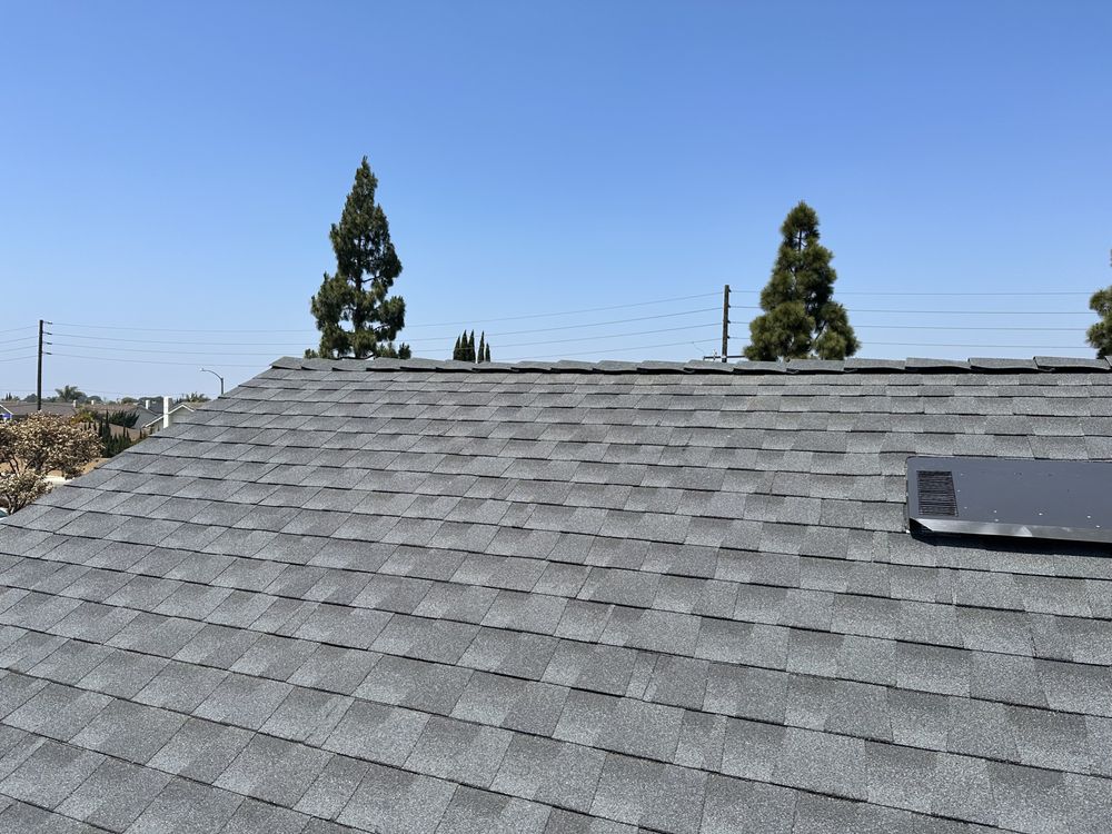 Slide of Rod's Roofing
