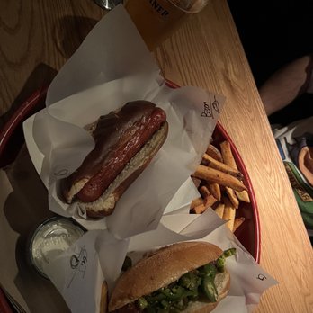 Wursthaus - cheddar jalapeño sausage on a grinder roll topped w/ drunken onions and jalapeños, bison w/cheddar & jalapeño sausage on pretzel roll - Pubs Near Me - Santa Ana, California Wursthaus - cheddar jalapeño sausage on a grinder roll topped w/ drunken onions and jalapeños, bison w/cheddar & jalapeño sausage on pretzel roll - Pubs Near Me - Santa Ana, California