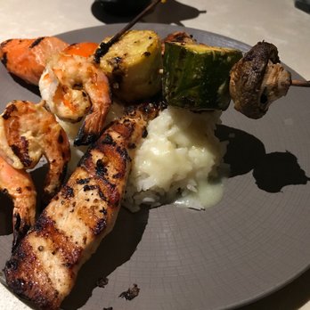 Seven Fish - Mixed Grill, $21. Shrimp overcooked, chicken was OK. Veggies need a steak knife to cut. Sauce over rice was tasty - Seafood Near Me - Key West, Florida Seven Fish - Mixed Grill, $21. Shrimp overcooked, chicken was OK. Veggies need a steak knife to cut. Sauce over rice was tasty - Seafood Near Me - Key West, Florida
