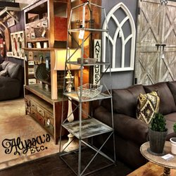 Alyssa's Etc - This tall metal shelf is becoming one of our favorites. It can be used in any room, no matter your design style.