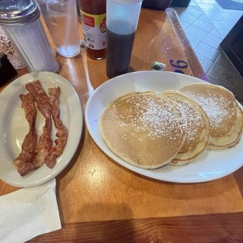 Breakfast Brunch - Full stack of pancakes with a side of bacon - Breakfast & Brunch Near Me - Greensboro, North Carolina Breakfast Brunch - Full stack of pancakes with a side of bacon - Breakfast & Brunch Near Me - Greensboro, North Carolina