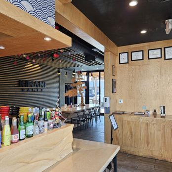 Kiwami Ramen - Only a couple of booths inside, this wrap around area and the large community table. Booths and tables outside. - Ramen Near Me - Tucson, Arizona