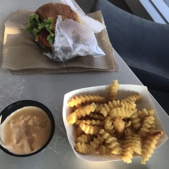 Shake Shack Seaport - Fries with cheese sauce - Burgers Near Me - Boston, Massachusetts Shake Shack Seaport - Fries with cheese sauce - Burgers Near Me - Boston, Massachusetts