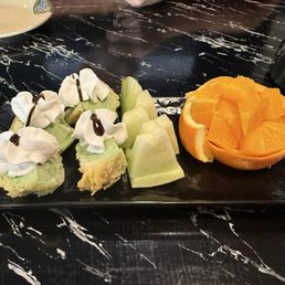 Fried matcha ice cream with orange and honeydew melon slices. Delicious!! Fried matcha ice cream with orange and honeydew melon slices. Delicious!!