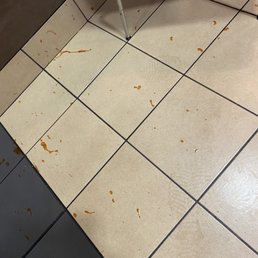 Smeared ketchup everywhere.