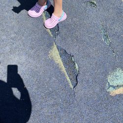 Todd Beamer Park - There were a lot of these holes and little hard black pebbles would still to the kids feet and hurt them