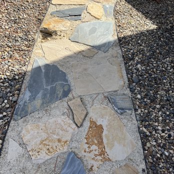 Flutterby Gardens Landscaping - huge gaps between the stones filled with common sand, completely inadequate and not getting industry standards - Landscaping Near Me - Boise, Idaho